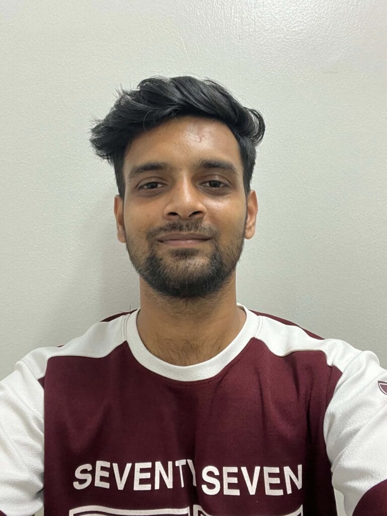 A man smiling for a selfie